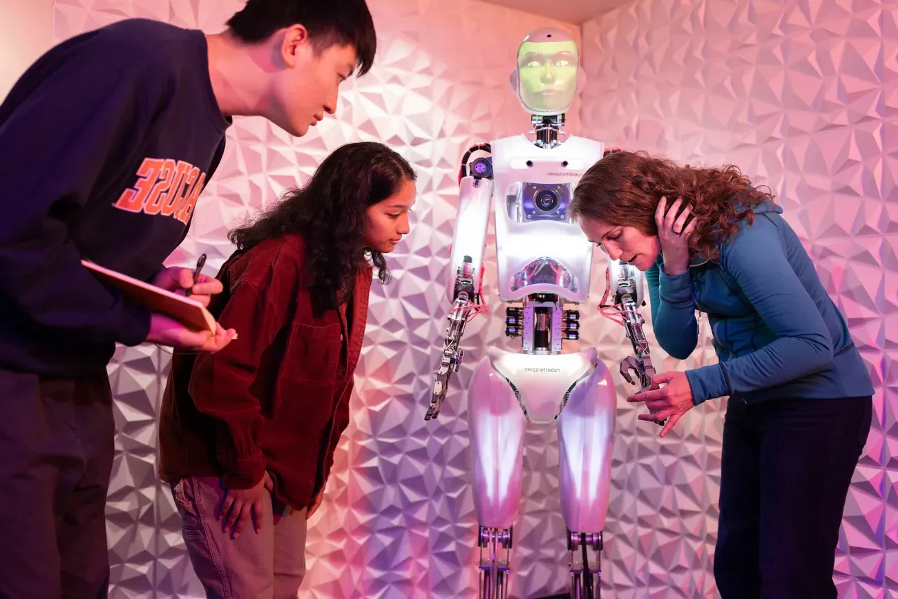 Students and professor in Robotics Link Lab